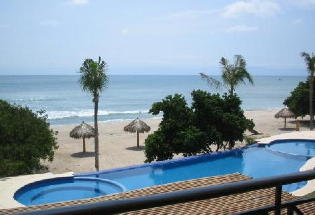 Beautiful view overlooking pool to ocean.